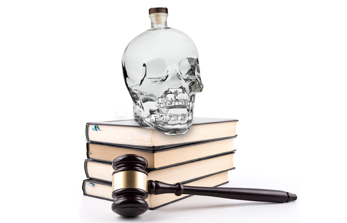 Crystal head Vodka with judge's gavel