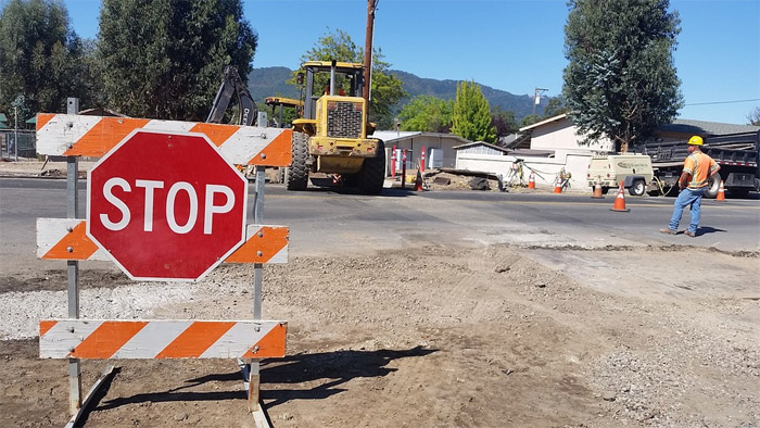 road work STOP sign